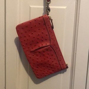 Dooney & Bourke pink ostrich leather clutch